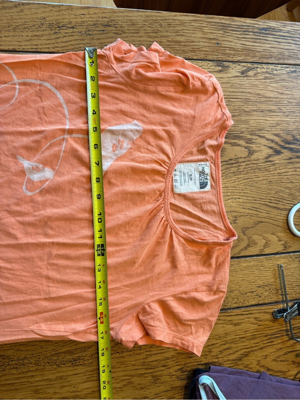 Soft orange/peachand white vintage bird print t-shirt by The North Face - Picture 7 of 7
